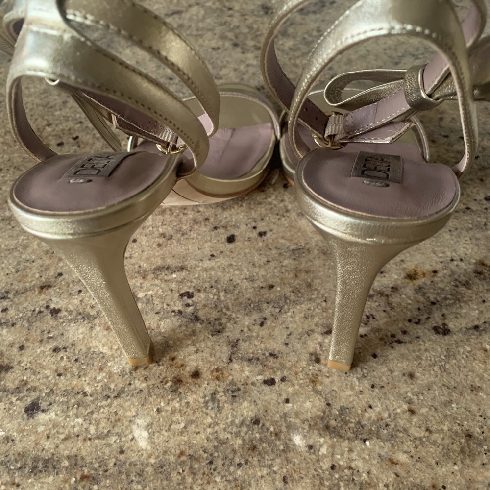 Gold ankle strap with bow heels